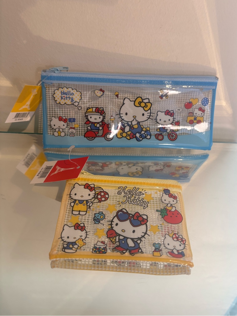 Hello Kitty blue and yellow pencil case bundle